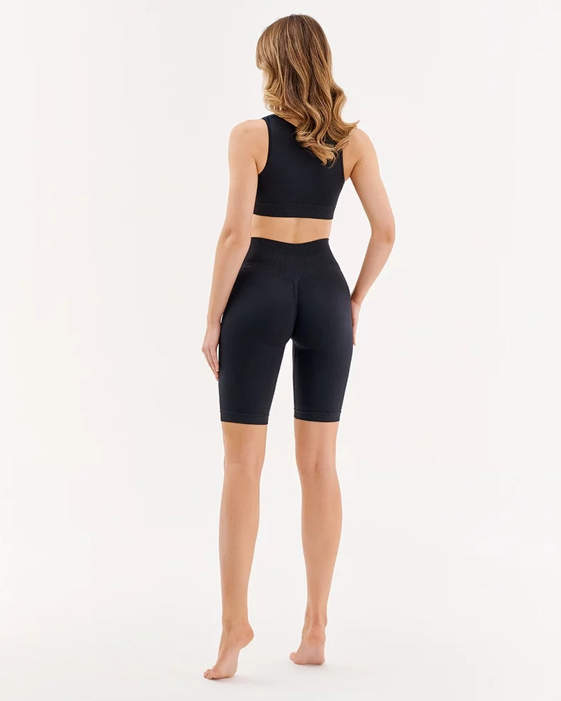 Czarne bezszwowe krótkie sportowe legginsy kolarki z efektem push up Gabriella Seamless Tracks