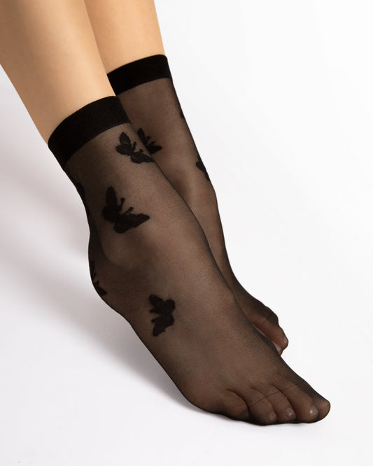 Czarne skarpetki rajstopowe wzór motyle bezuciskowy ściągacz Fiore Summer 15 DEN