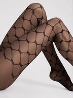 Czarne bezmajtkowe wzorzyste rajstopy imitacja kabaretki duże oczka t-band Fiore Asteroid 20 DEN