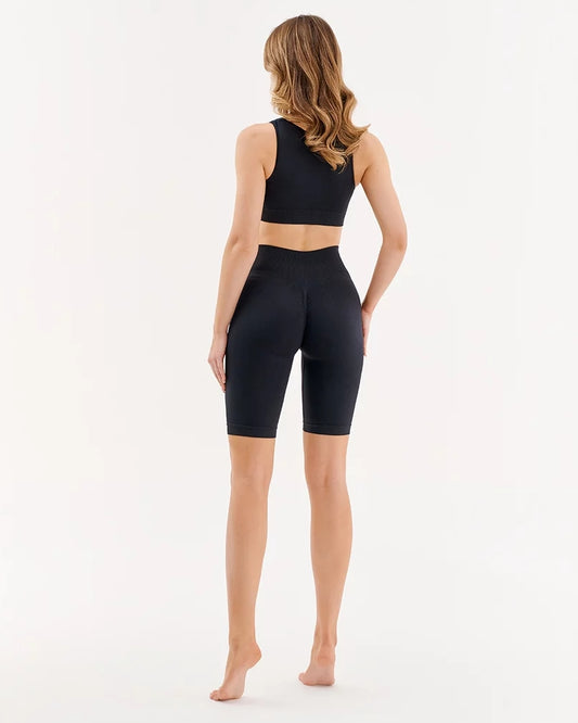 Czarne bezszwowe krótkie sportowe legginsy kolarki z efektem push up Gabriella Seamless Tracks