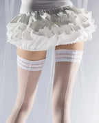 białe pończochy samonośne ze szwem 20 den na ślub