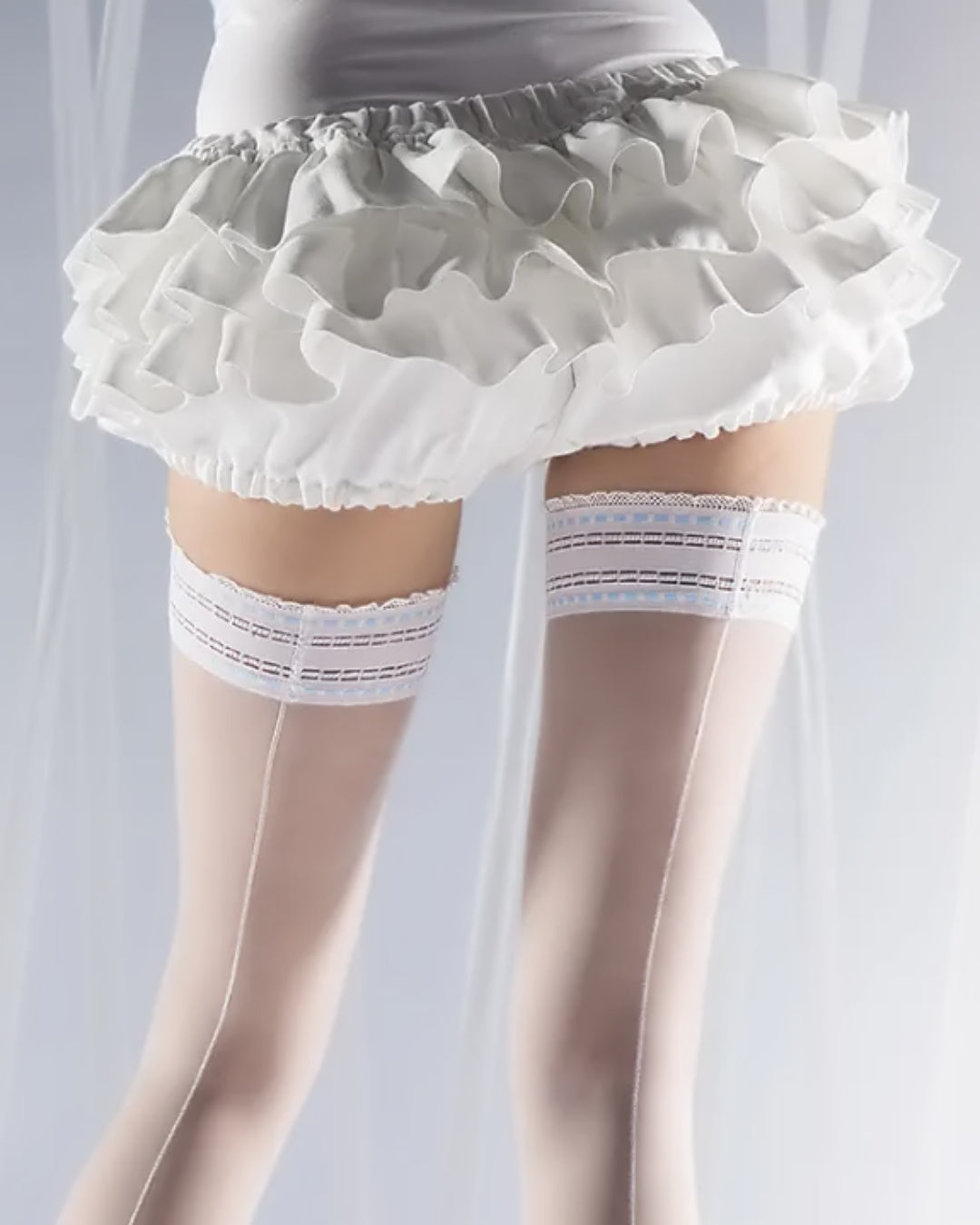 białe pończochy samonośne ze szwem 20 den na ślub