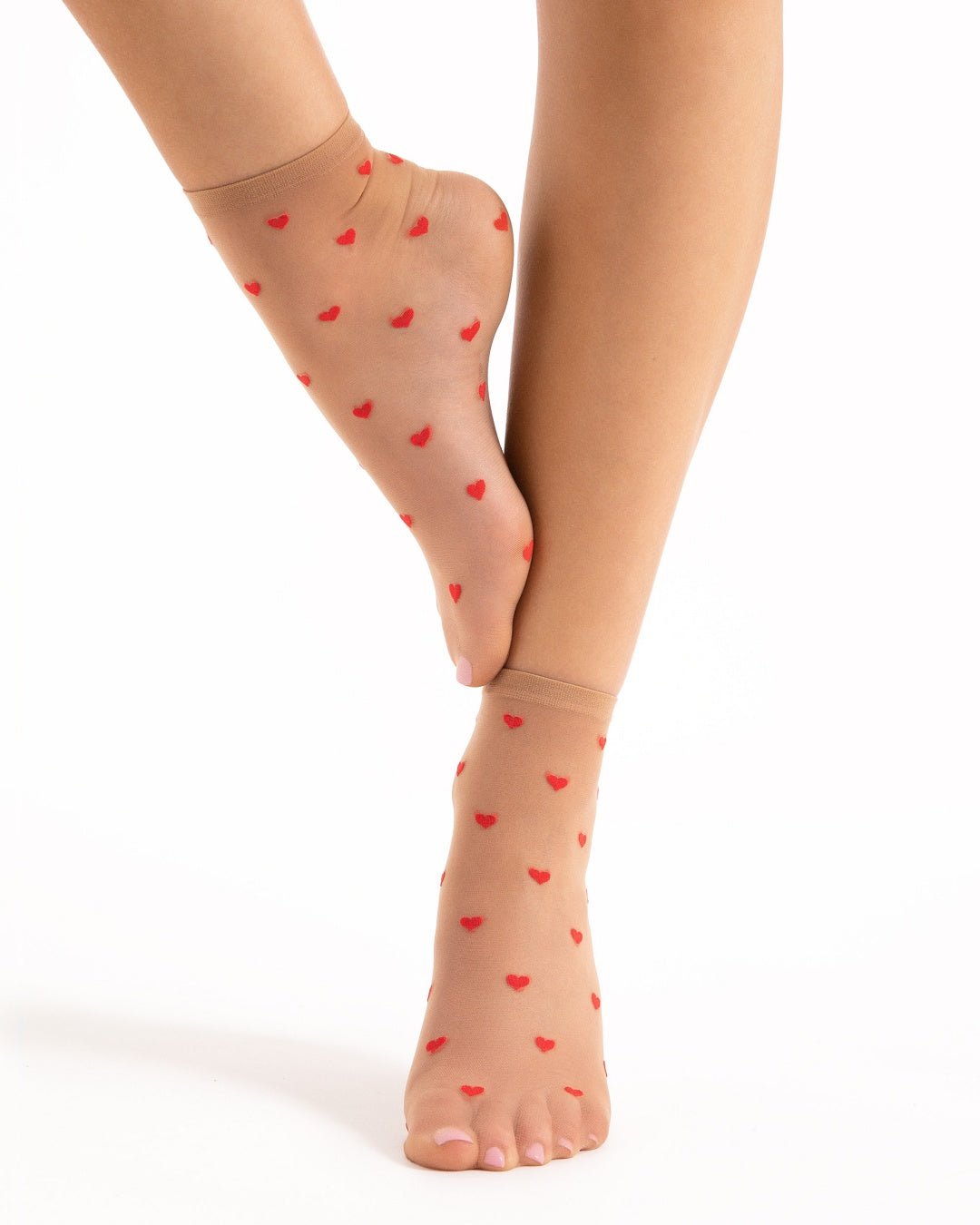 beżowe damskie skarpetki rajstopowe w czerwone serduszka